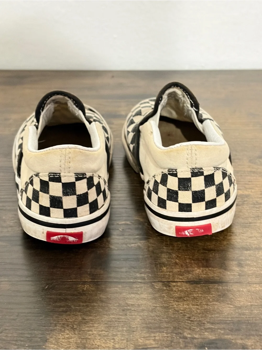 Vans Kids Slip-On Checkerboard Sneakers in Black and Cream